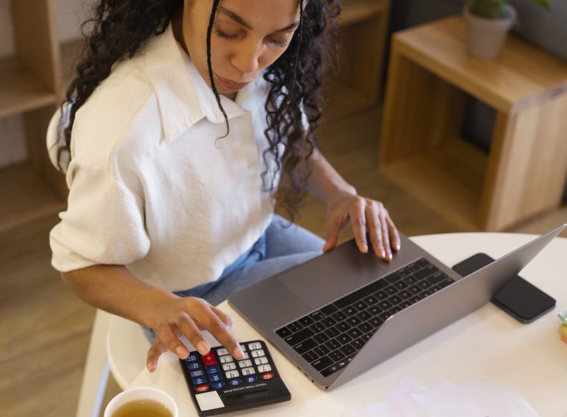 high-angle-woman-working-laptop
